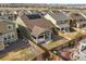 Aerial view of home showcasing backyard with patio and neighborhood landscape at 14881 Chicago St, Parker, CO 80134