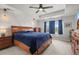 Main bedroom features tray ceiling and natural light at 14881 Chicago St, Parker, CO 80134