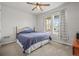 Bedroom with ceiling fan and natural light at 14881 Chicago St, Parker, CO 80134