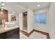 Bathroom with a vessel sink and a tiled walk-in shower, offering modern comfort at 20532 E Lake Cir, Centennial, CO 80016