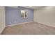 Cozy bedroom with soft carpet, natural light from the window, and fresh neutral paint at 20532 E Lake Cir, Centennial, CO 80016