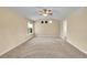 Large bedroom with neutral carpet and multiple windows for natural light at 20532 E Lake Cir, Centennial, CO 80016