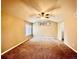 Bedroom with carpet floor, fan and a window that brings natural light at 20532 E Lake Cir, Centennial, CO 80016