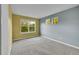 Bright bedroom with large windows and neutral carpet, perfect for relaxation at 20532 E Lake Cir, Centennial, CO 80016