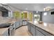 Modern kitchen featuring granite counters, stainless appliances, and eat-in breakfast nook at 20532 E Lake Cir, Centennial, CO 80016