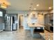 Beautiful kitchen with stainless steel appliances, ample cabinet space, and a functional island perfect for cooking at 20532 E Lake Cir, Centennial, CO 80016