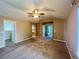 Open living room with doorways leading to other rooms and carpet flooring at 20532 E Lake Cir, Centennial, CO 80016