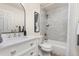 Stylish bathroom featuring modern fixtures and a shower with tiled walls at 5733 S Yakima Way, Aurora, CO 80015