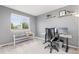 Bright office space with a large window, a comfortable desk, and minimalist decor at 5733 S Yakima Way, Aurora, CO 80015