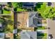 Birds eye view of a residential property showcasing the backyard, fencing, and surrounding neighborhood at 3055 Carson St, Aurora, CO 80011