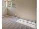 Cozy bedroom featuring soft carpet and a bright window, creating a peaceful and inviting atmosphere at 3055 Carson St, Aurora, CO 80011