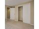 Bedroom with neutral carpet, doors to closet and hallway, and a well-lit space for rest and relaxation at 3055 Carson St, Aurora, CO 80011