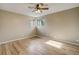 Bedroom with windows and hardwood flooring at 3055 Carson St, Aurora, CO 80011