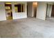 Spacious living area with open layout, leading into the kitchen, offering an inviting area to customize and make your own at 13601 E Marina Dr # 508, Aurora, CO 80014