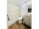 Bathroom with a shower-tub combination and sliding glass door at 8625 Clay St # 228, Westminster, CO 80031