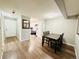 Open-concept dining area featuring wood floors and space for a table and chairs at 8625 Clay St # 228, Westminster, CO 80031