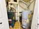 The home's utility room with water heater, furnace, and plumbing at 8625 Clay St # 228, Westminster, CO 80031