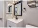 Bathroom with a white vanity and black hardware at 2280 S Oswego Way # 104, Aurora, CO 80014