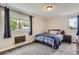 Comfortable bedroom featuring a window and gray-tone carpet at 2280 S Oswego Way # 104, Aurora, CO 80014