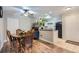 Charming dining area next to the kitchen features a wooden table with seating for four at 2280 S Oswego Way # 104, Aurora, CO 80014