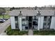 View of exterior apartment building featuring patios and grey accented trim at 2280 S Oswego Way # 104, Aurora, CO 80014