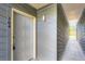 Exterior view of a condo's front entrance, featuring a door with a visible unit number 104 at 2280 S Oswego Way # 104, Aurora, CO 80014