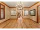 Stately dining room with wood floors and a grand chandelier at 4160 S Humboldt St, Cherry Hills Village, CO 80113