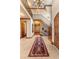 Grand foyer with staircase, hardwood floors, high ceilings and elegant lighting fixtures at 4160 S Humboldt St, Cherry Hills Village, CO 80113