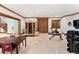 Basement gym with wood trim, exercise equipment, and a sauna at 4160 S Humboldt St, Cherry Hills Village, CO 80113