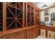 Climate-controlled wine cellar featuring custom shelving and storage at 4160 S Humboldt St, Cherry Hills Village, CO 80113