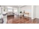 Spacious living room featuring hardwood floors, neutral walls and an open floor plan at 5530 Lewiston Ct, Denver, CO 80239