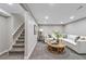 Finished basement boasts a large sectional sofa and contemporary decor, perfect for relaxing at 8280 Auburn Ln, Westminster, CO 80031