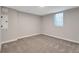 Bedroom featuring neutral walls, carpet, and a window providing natural light at 8280 Auburn Ln, Westminster, CO 80031