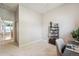 Bedroom showing view into hallway and desk space at 2870 W Riverwalk Cir # B, Littleton, CO 80123