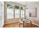 Bright dining area with natural light, hardwood floors, and modern decor at 2870 W Riverwalk Cir # B, Littleton, CO 80123