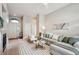 Cozy living room with hardwood floors, fireplace, and comfortable seating at 2870 W Riverwalk Cir # B, Littleton, CO 80123