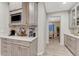 A kitchen area with quartz countertops, cabinetry with pulls, and stainless steel appliances at 6973 Daventry Pl, Castle Pines, CO 80108