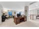 Open loft area with desk, chair, and natural light, providing a versatile and functional living space at 6973 Daventry Pl, Castle Pines, CO 80108