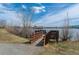 Picturesque wooden dock on a calm lake, perfect for enjoying the serene waterfront and natural surroundings at 9836 W Freiburg Dr # 4E, Littleton, CO 80127