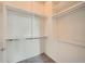 Walk-in closet with shelving and hanging rods, perfect for organizing clothes and accessories at 7700 E 29Th Ave # 404, Denver, CO 80238