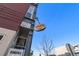 Close-up of a local bakery cafe sign in a neighborhood setting against a clear sky at 7700 E 29Th Ave # 404, Denver, CO 80238
