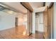 Stylish interior view featuring an open floor plan, hardwood floors, and unique industrial design elements at 7700 E 29Th Ave # 404, Denver, CO 80238