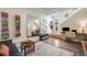 Inviting living area with open floor plan, decorative rug, and modern furnishings at 2607 W 24Th Ave, Denver, CO 80211