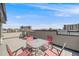Spacious rooftop deck featuring outdoor seating and beautiful city views perfect for entertaining and relaxation at 2607 W 24Th Ave, Denver, CO 80211