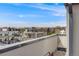 Enjoy stunning mountain views from this rooftop featuring expansive vistas and clear blue skies at 2607 W 24Th Ave, Denver, CO 80211
