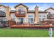 Enjoy outdoor living with a spacious deck, perfect for entertaining and relaxation at 4603 S Abilene Cir, Aurora, CO 80015