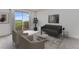 Modern living room with sliding glass door access to the deck and outdoor views at 4603 S Abilene Cir, Aurora, CO 80015