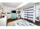 Bedroom showcasing a Paw Patrol themed bed and mint green dresser at 7440 S Shenandoah Dr, Elizabeth, CO 80107