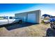 Exterior of the shed with a truck parked out front at 7440 S Shenandoah Dr, Elizabeth, CO 80107