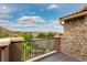 Exterior balcony overlooking neighborhood street and views at 9228 Sori Ln, Highlands Ranch, CO 80126